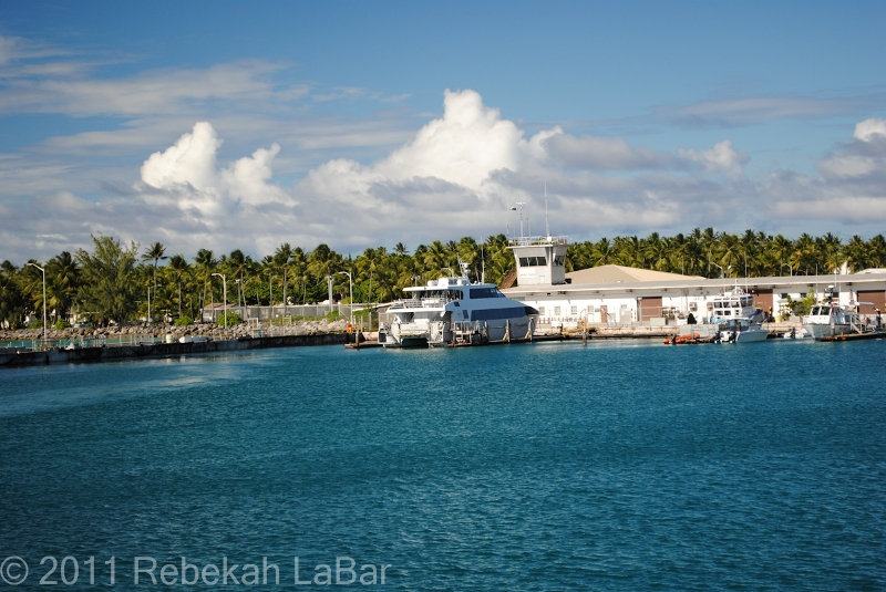 Private Anderson at Kwajalein Harbor, one of two catamarans that daily takes workers to Meck and back
